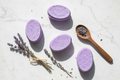 Lavender soaps flat lay on marble